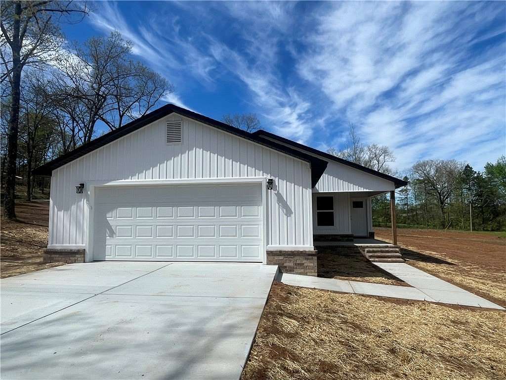 1.63 Acres of Land with Home for Sale in Clarksville, Arkansas