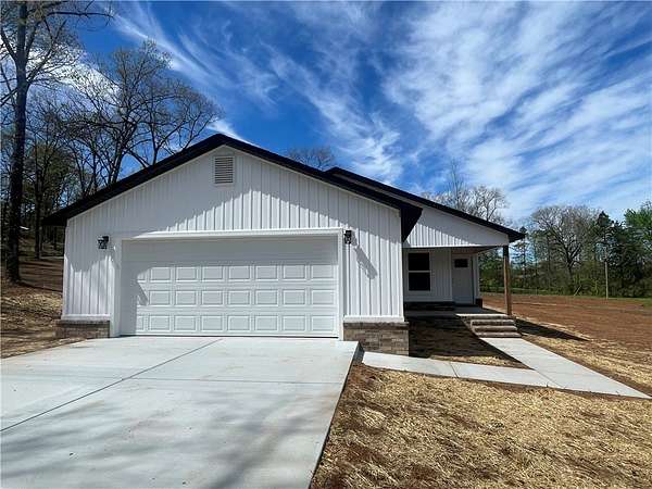 1.63 Acres of Land with Home for Sale in Clarksville, Arkansas