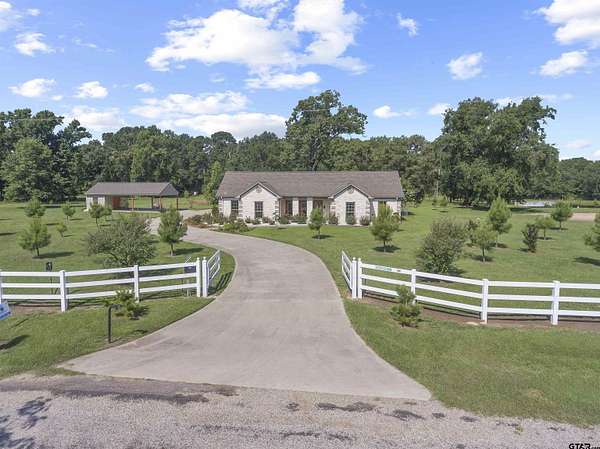 8.9 Acres of Land with Home for Sale in Pittsburg, Texas