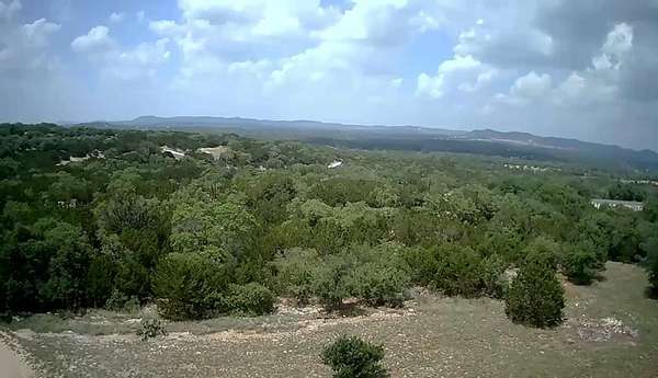 10 Acres of Land with Home for Sale in Pipe Creek, Texas