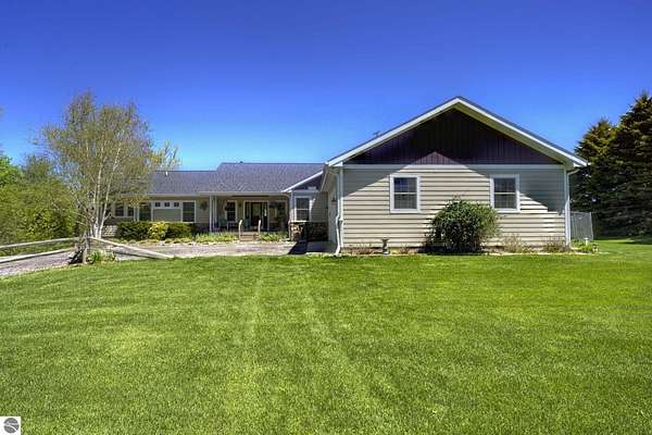 5.19 Acres of Land with Home for Sale in Suttons Bay, Michigan