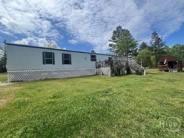 8.49 Acres of Land with Home for Sale in Swainsboro, Georgia