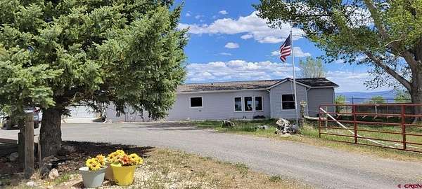 35 Acres of Land with Home for Sale in Hotchkiss, Colorado