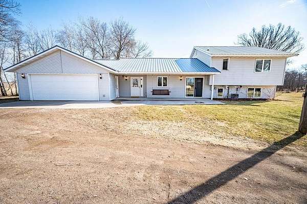 23.3 Acres of Land with Home for Sale in Amery, Wisconsin