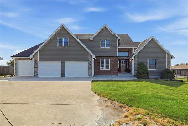 2.55 Acres of Land with Home for Sale in Archie, Missouri