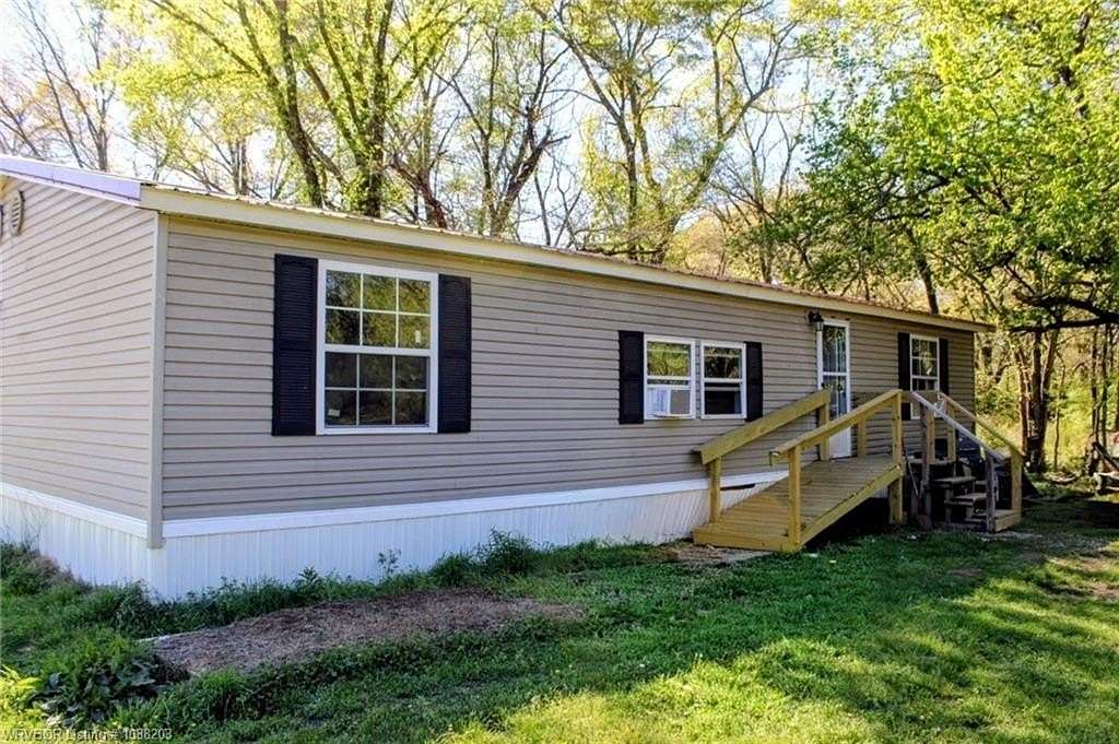 5 Acres of Land with Home for Sale in Muldrow, Oklahoma