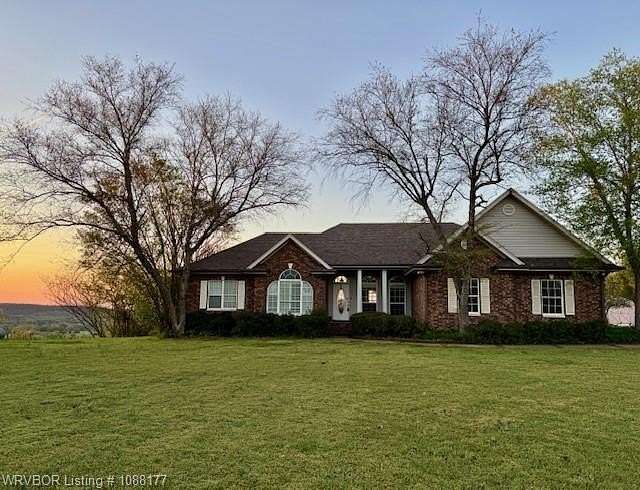 7.1 Acres of Land with Home for Sale in Booneville, Arkansas