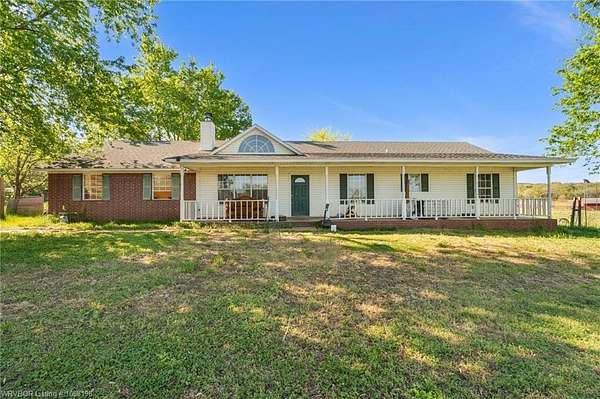 7.66 Acres of Land with Home for Sale in Van Buren, Arkansas