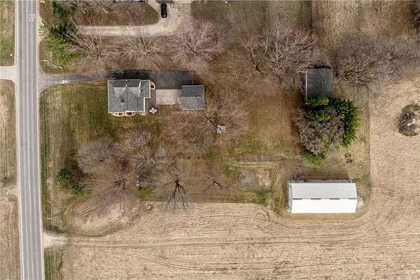 5 Acres of Land with Home for Sale in Austin Township, Minnesota