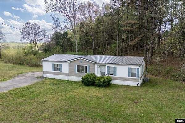 37 Acres of Land with Home for Sale in Paris, Tennessee