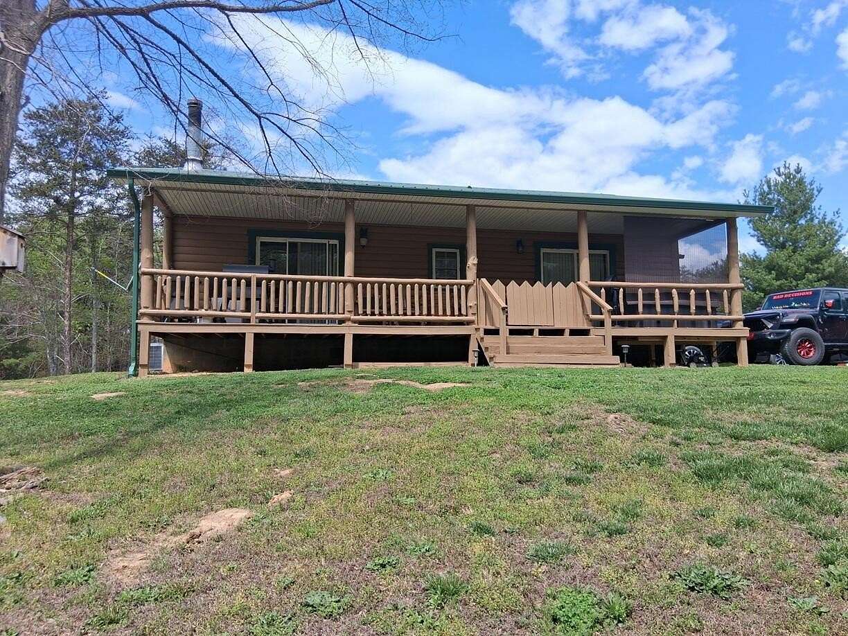 6.89 Acres of Land with Home for Sale in Parrottsville, Tennessee