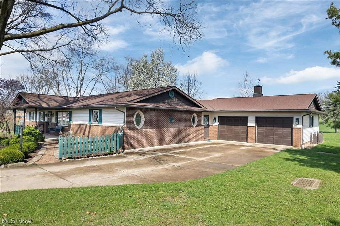 1.5 Acres of Land with Home for Sale in Louisville, Ohio