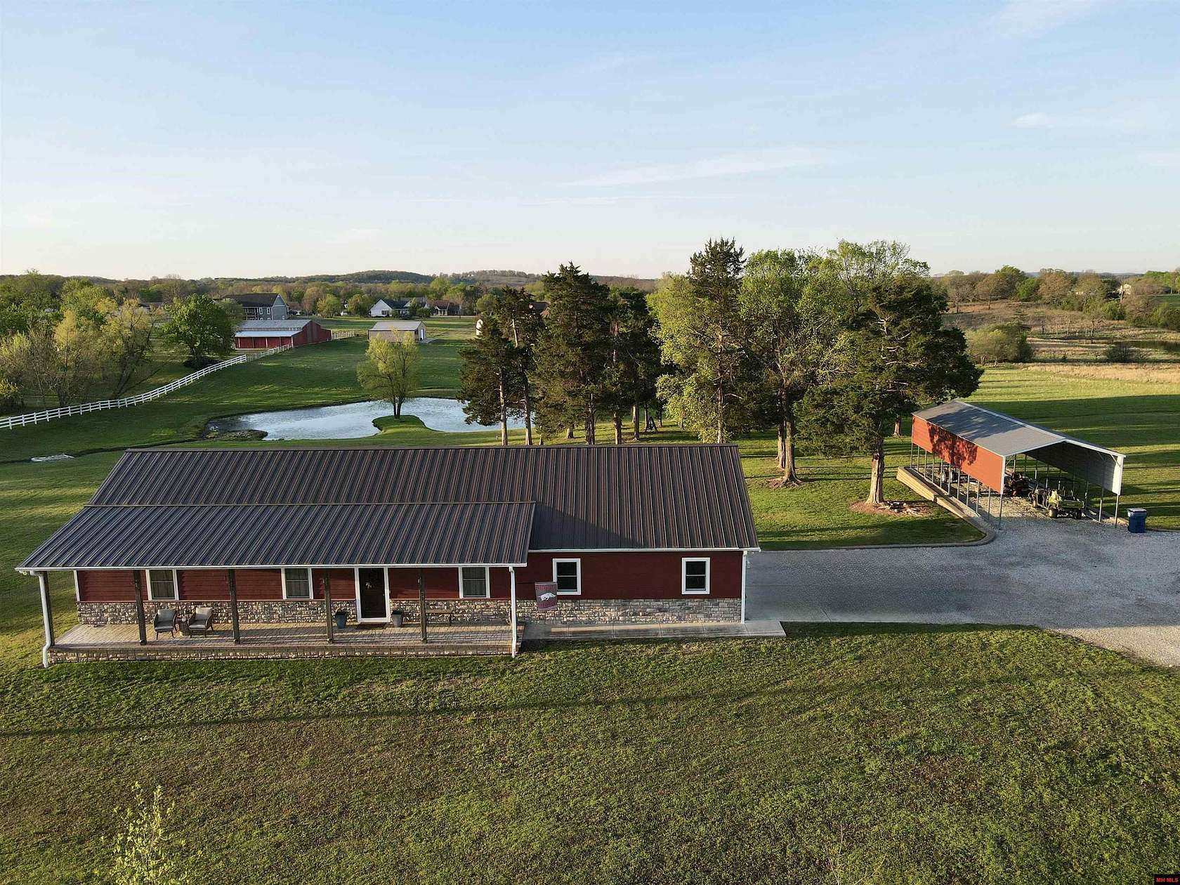 9.84 Acres of Land with Home for Sale in Mountain Home, Arkansas