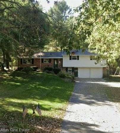 1.74 Acres of Land with Home for Sale in Holly, Michigan