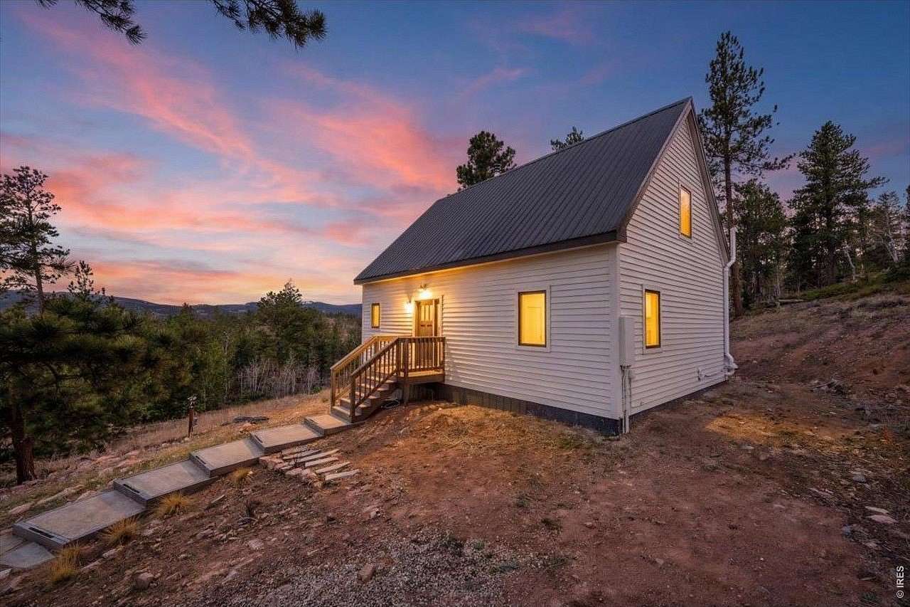 2.1 Acres of Land with Home for Sale in Red Feather Lakes, Colorado