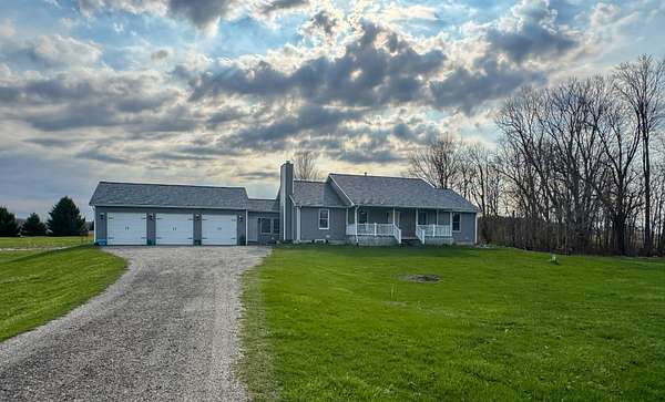 5.5 Acres of Land with Home for Sale in Eau Claire, Michigan