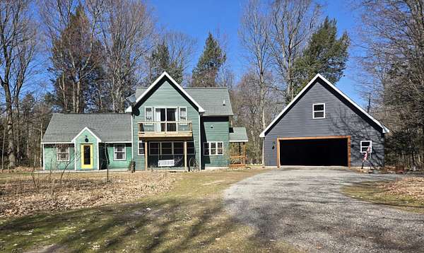 10 Acres of Land with Home for Sale in New Era, Michigan