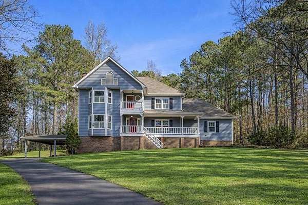 8.1 Acres of Land with Home for Sale in McDonough, Georgia