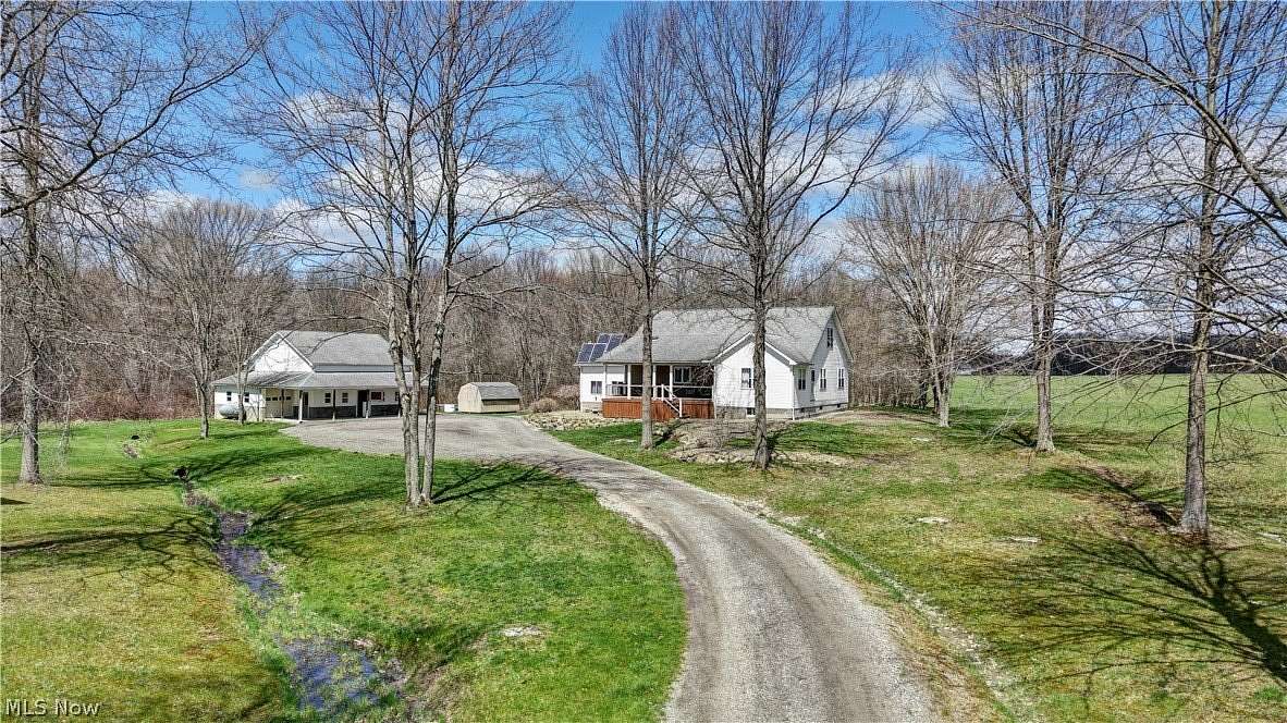 6.89 Acres of Land with Home for Sale in West Farmington, Ohio