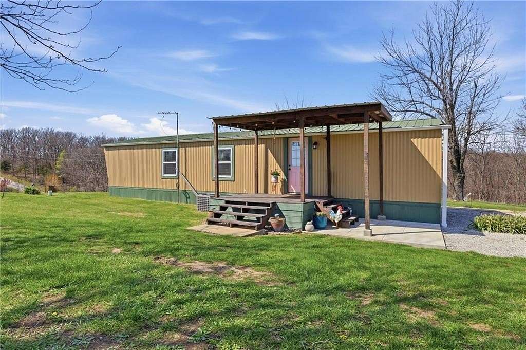 134 Acres of Land with Home for Sale in Rayville, Missouri