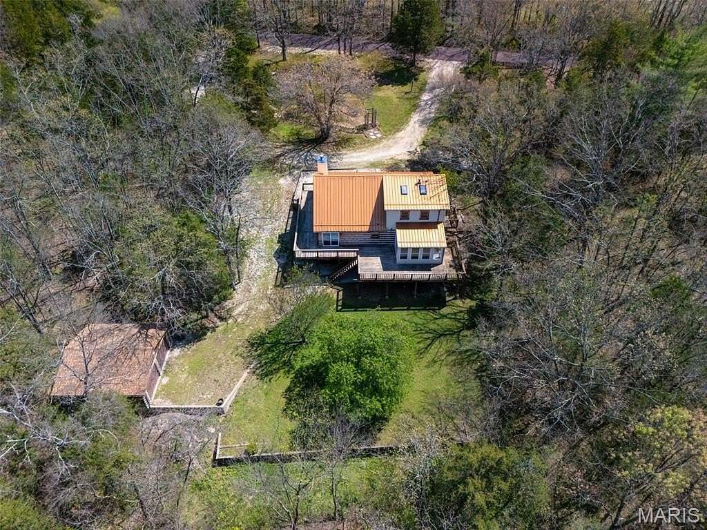 11.9 Acres of Land with Home for Sale in Festus, Missouri