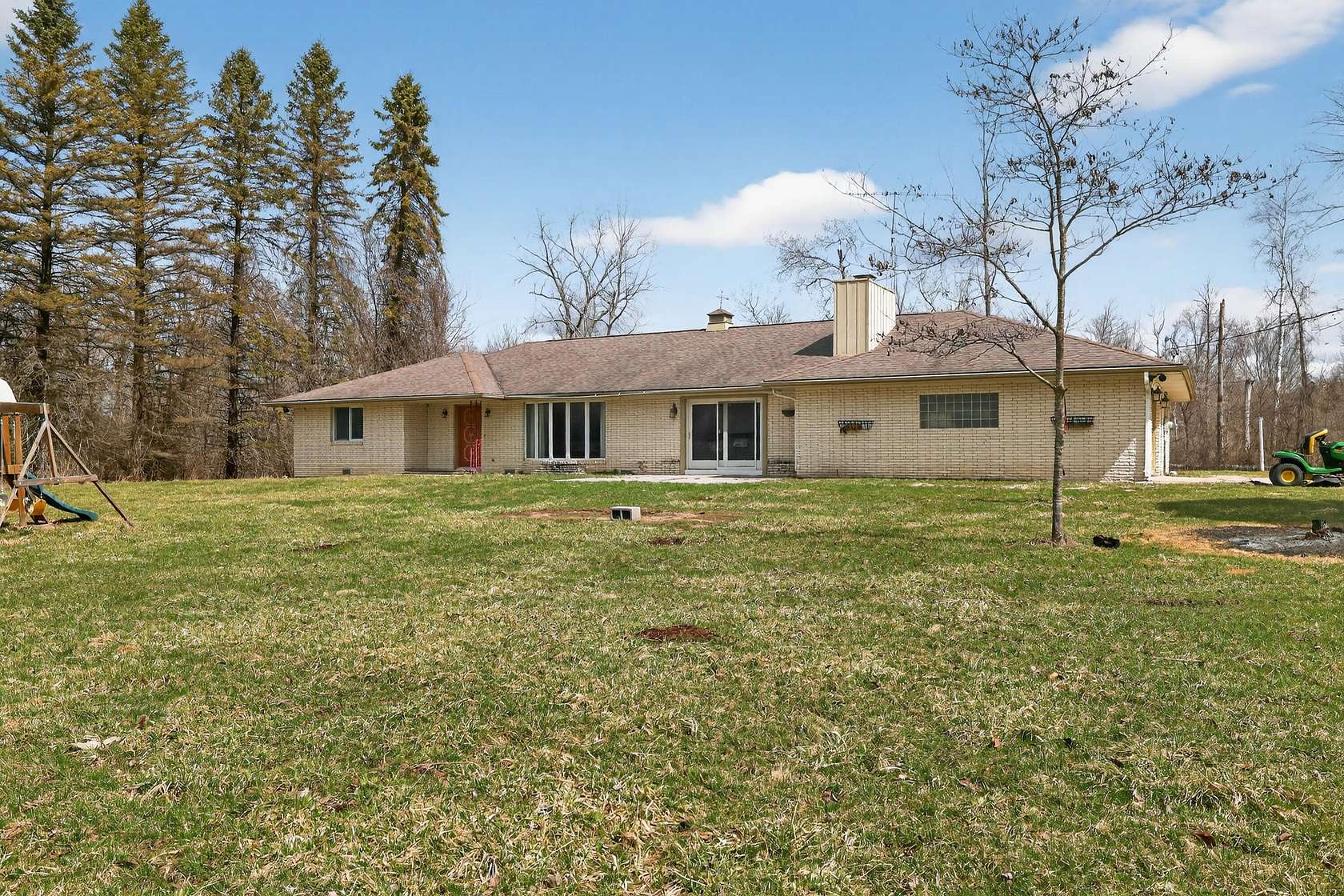 10 Acres of Land with Home for Sale in Turner, Michigan