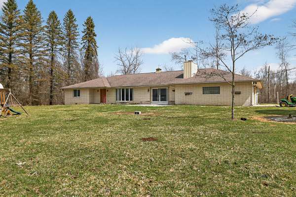 10 Acres of Land with Home for Sale in Turner, Michigan