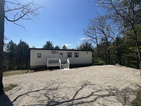 2.2 Acres of Land with Home for Sale in Rockaway Beach, Missouri