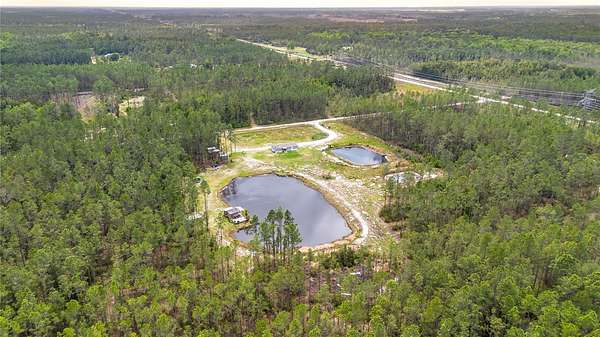 13 Acres of Land with Home for Sale in Fort McCoy, Florida
