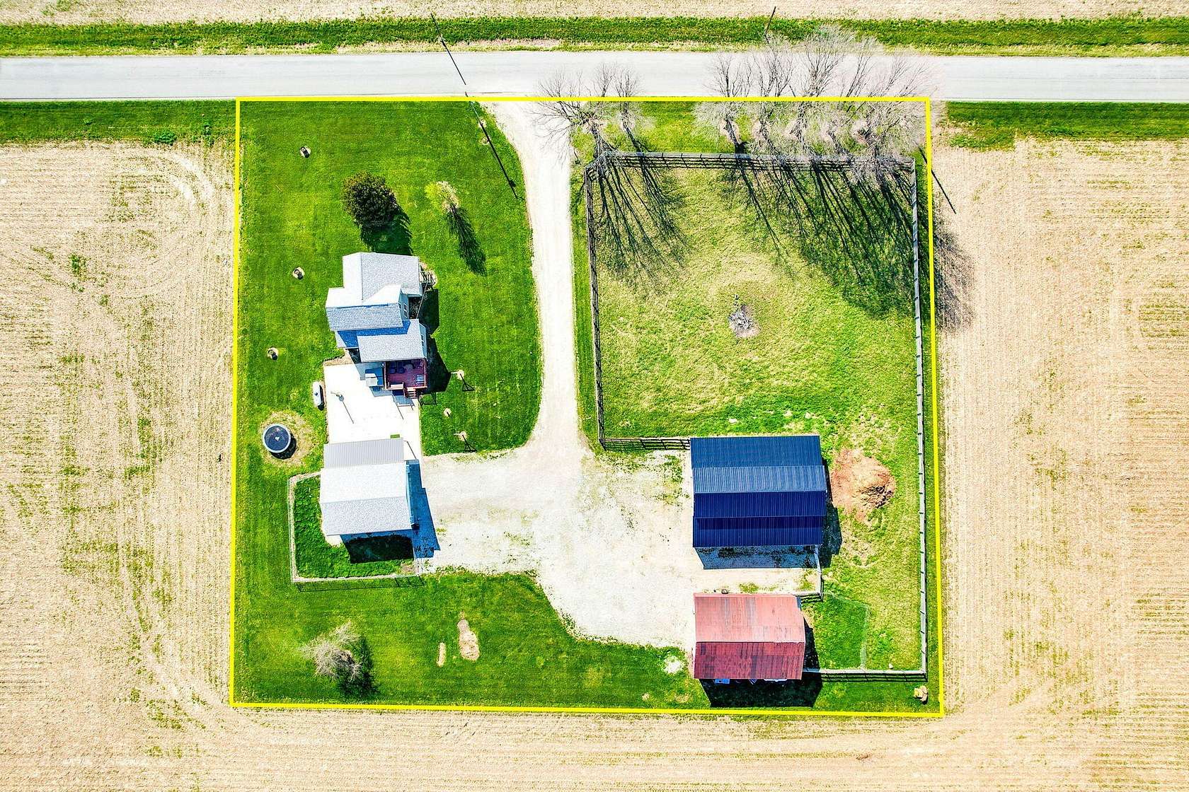 1.64 Acres of Land with Home for Sale in Jackson Center, Ohio