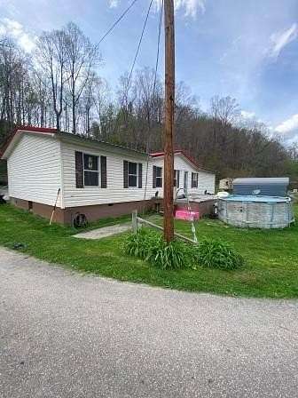 1.5 Acres of Land with Home for Sale in Jenkins, Kentucky