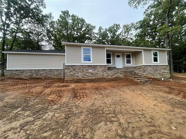 1.63 Acres of Land with Home for Sale in Clarksville, Arkansas