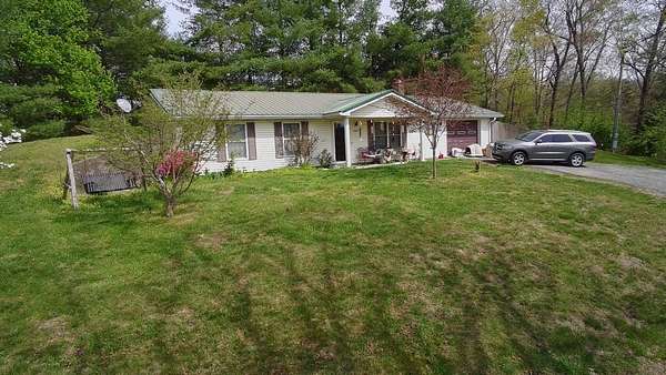 36 Acres of Recreational Land with Home for Auction in Loretto, Kentucky