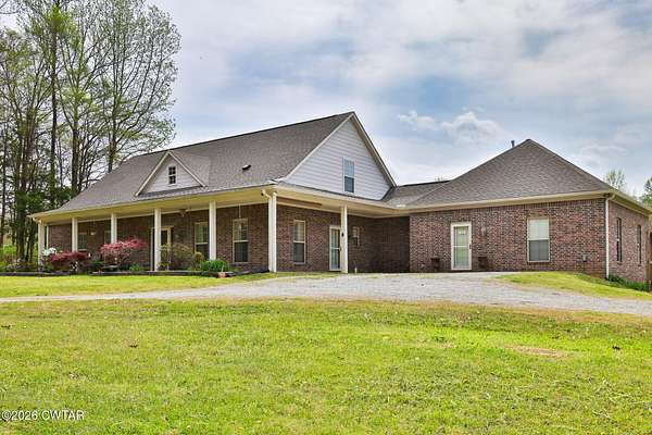 22.3 Acres of Land with Home for Auction in Beech Bluff, Tennessee