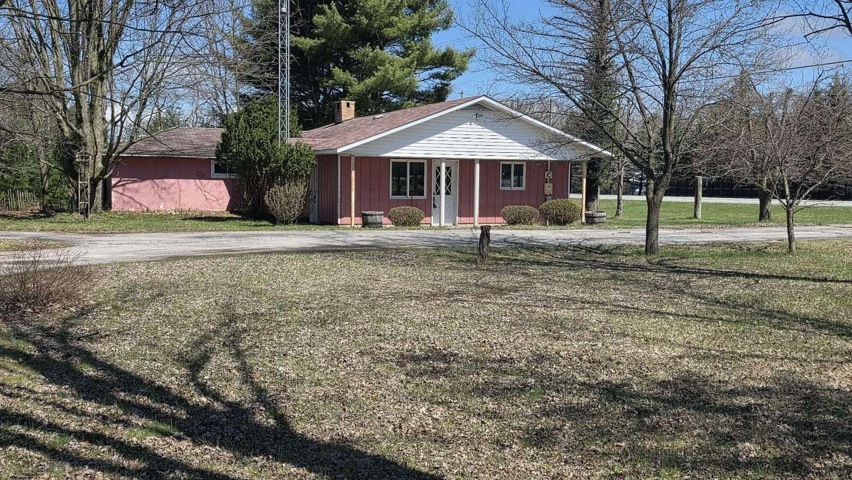 9.62 Acres of Land with Home for Sale in Free Soil, Michigan