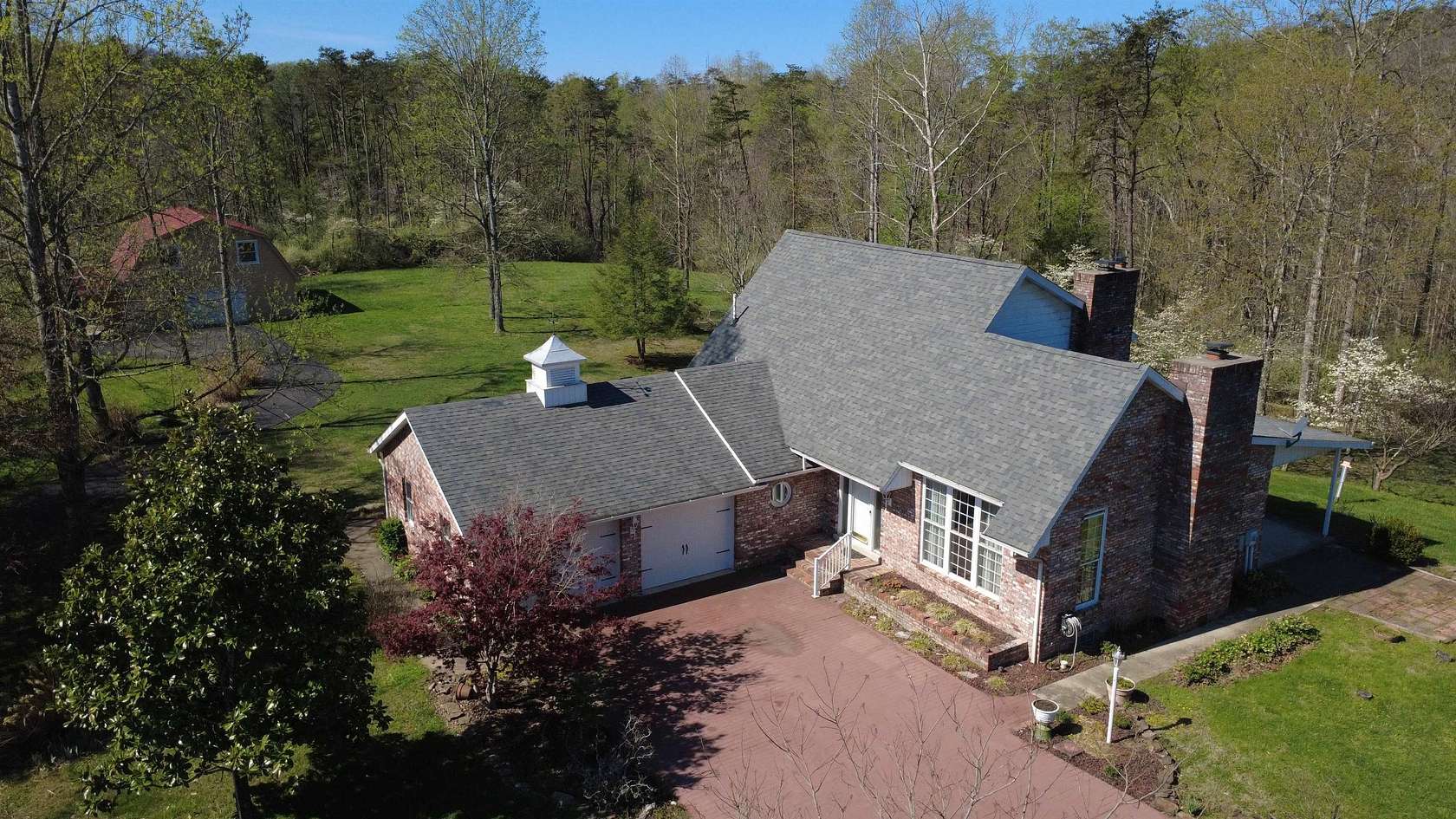 79 Acres of Agricultural Land with Home for Sale in Salt Rock, West Virginia