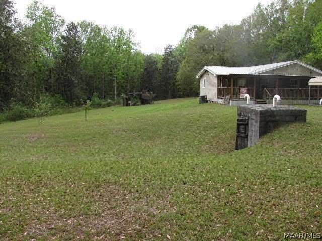 7 Acres of Land with Home for Sale in Highland Home, Alabama