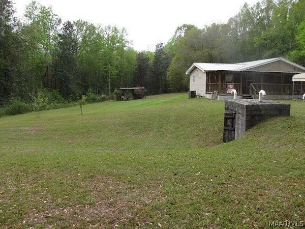 7 Acres of Land with Home for Sale in Highland Home, Alabama