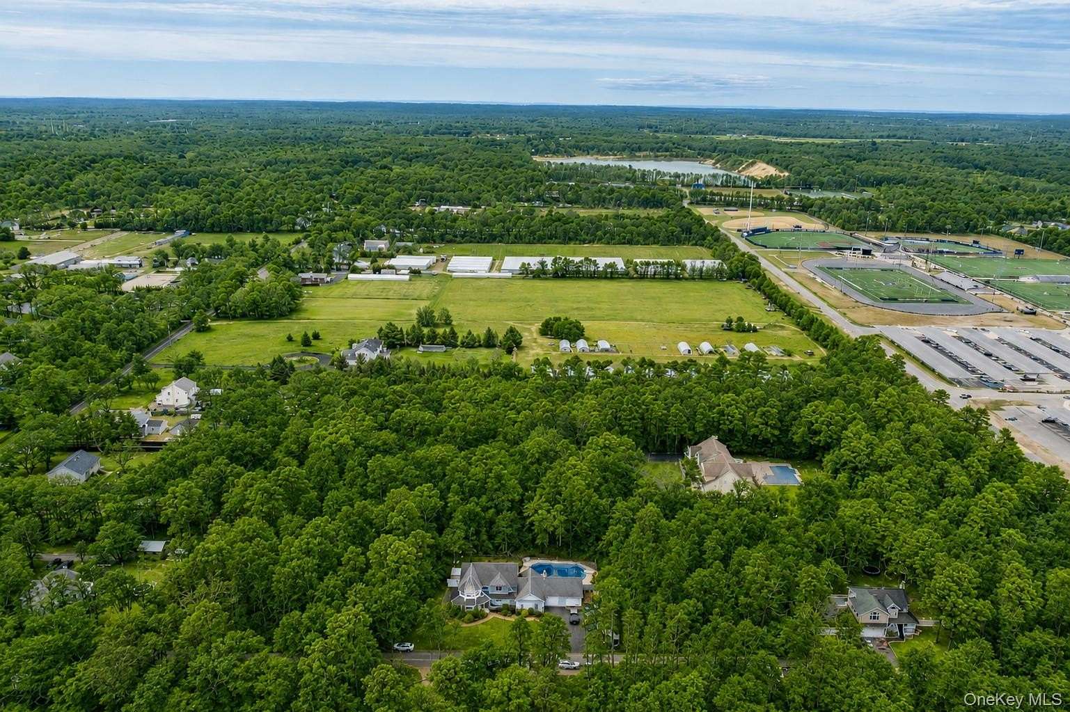 1.5 Acres of Land with Home for Sale in Manorville, New York