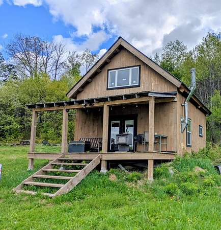 5.2 Acres of Land with Home for Sale in Stewartstown, New Hampshire