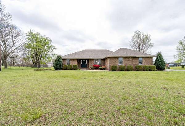 16.8 Acres of Land with Home for Sale in Springfield, Missouri