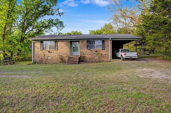 45.9 Acres of Recreational Land with Home for Sale in Henderson, Tennessee
