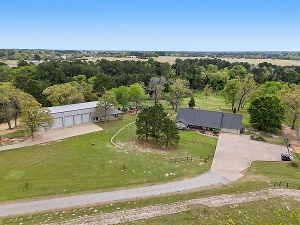 95 Acres of Agricultural Land with Home for Sale in Grapeland, Texas
