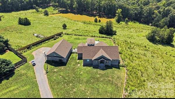 2.59 Acres of Land with Home for Sale in New London, North Carolina
