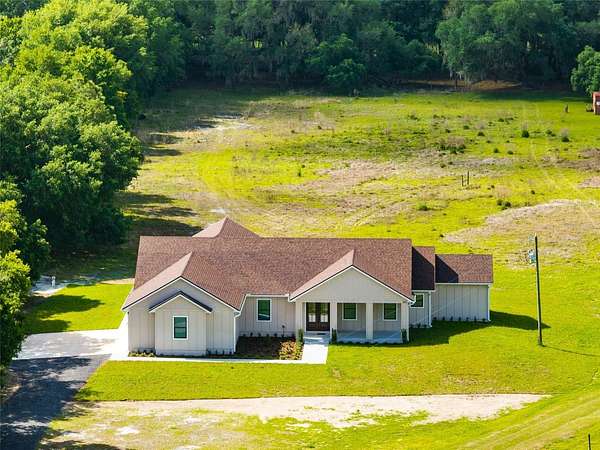 7.29 Acres of Land with Home for Sale in Kenansville, Florida