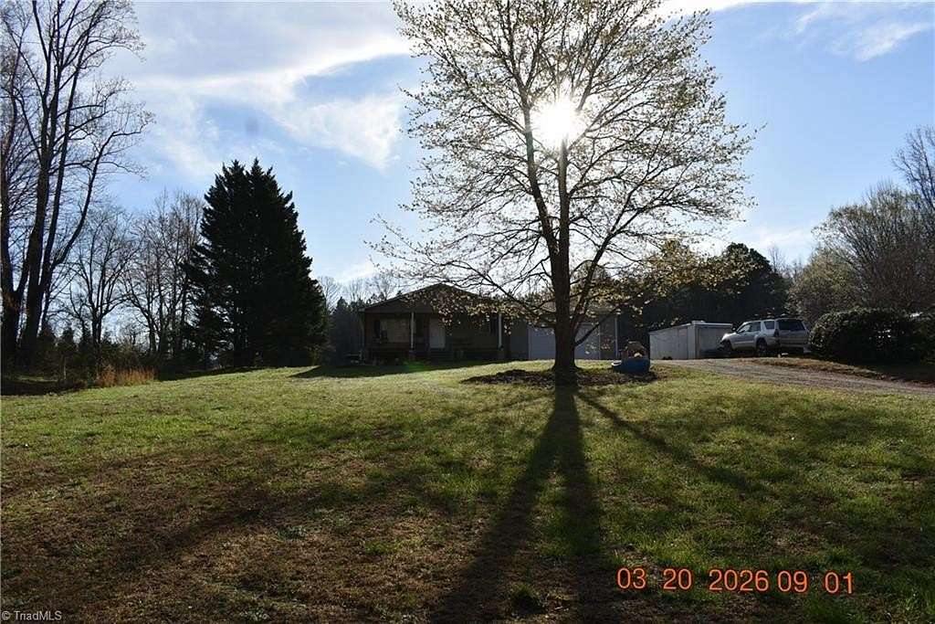 5.84 Acres of Land with Home for Sale in Summerfield, North Carolina