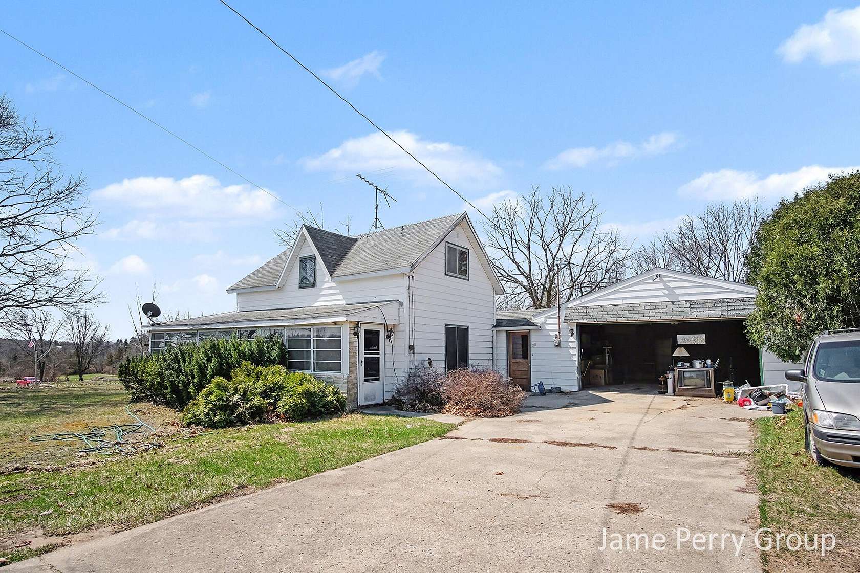 18 Acres of Land with Home for Sale in Sheridan, Michigan