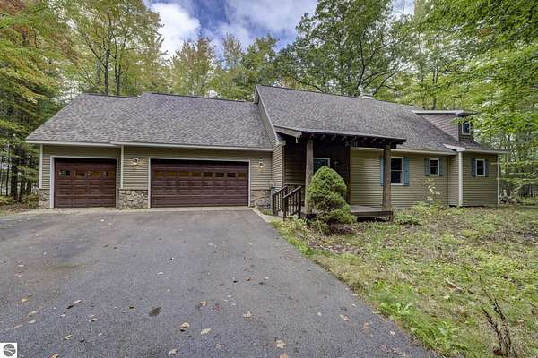 1.67 Acres of Land with Home for Sale in Kalkaska, Michigan