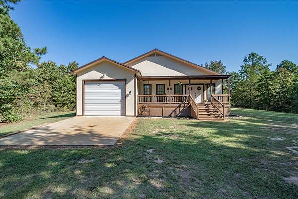 20 Acres of Recreational Land with Home for Sale in Avinger, Texas