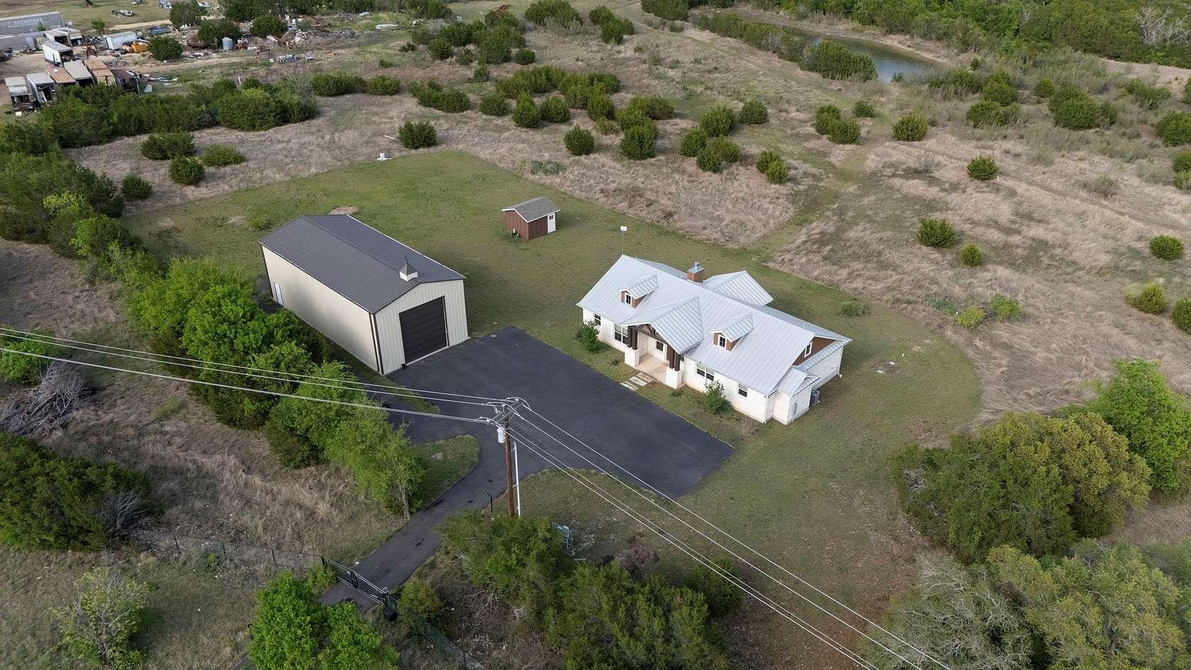 10 Acres of Recreational Land with Home for Sale in Bertram, Texas